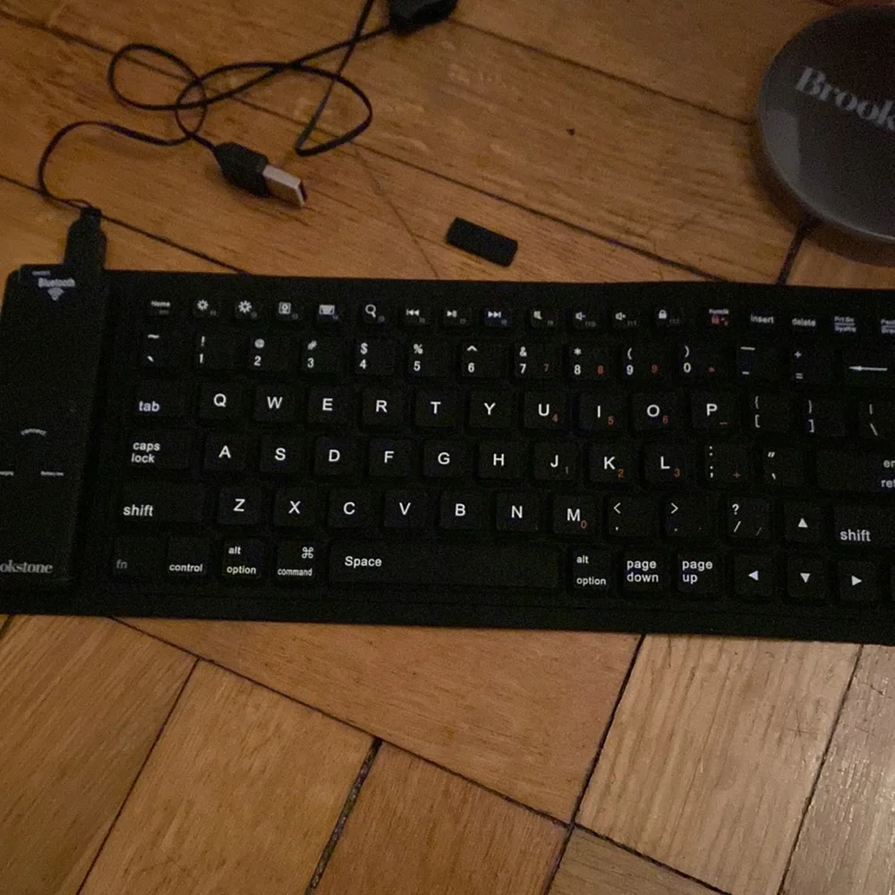 Never used- Brookstone Bluetooth roll up keyboard!